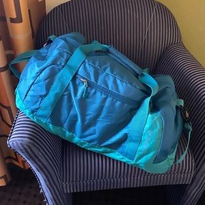 Turquoise Duffel Bag